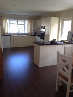 Laminate walnut, supplied and fitted.